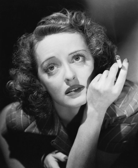 Bette with a cigarette.