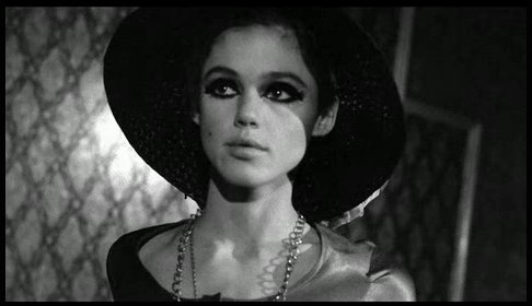 One classy dame...Edie Sedgwick in a black hat.